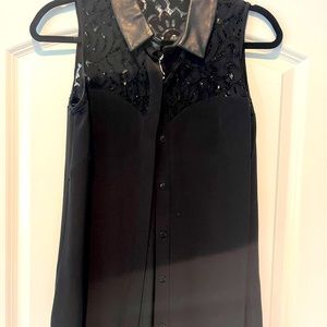 Milly sleeveless silk blouse with lace detail and leather collar.